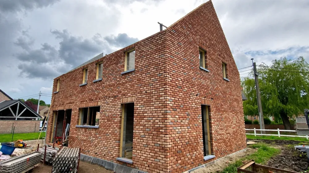 Construction de maison en briques par une entreprise de gros œuvre près de Braives